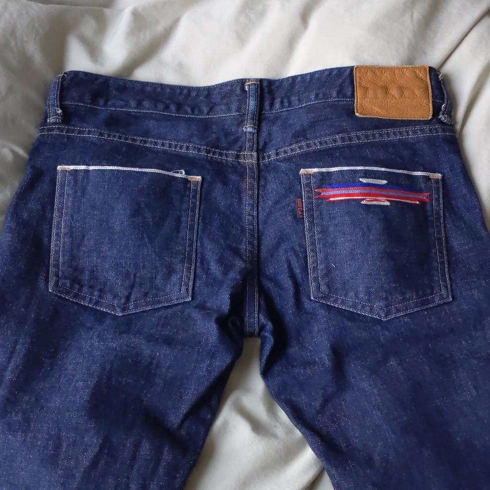 Crisp, dark blue jeans, 27
